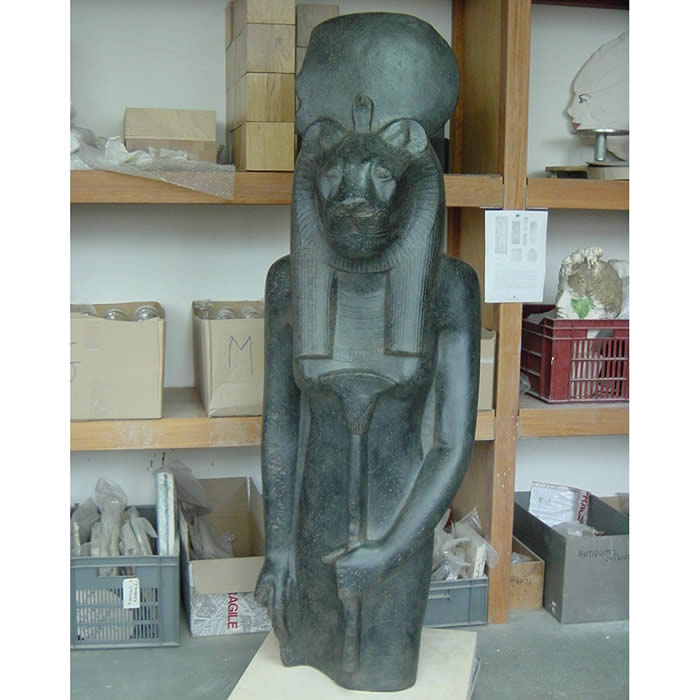 The goddess Sekhmet holding a papyrus - Egyptian antiquities - Reproduction d’une sculpture du Musée du Louvre, Paris