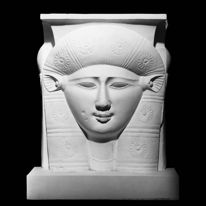 Fragment of a capital with column: head of the goddess Hathor - Egyptian antiquities - Reproduction d’une sculpture du Musée du Louvre, Paris